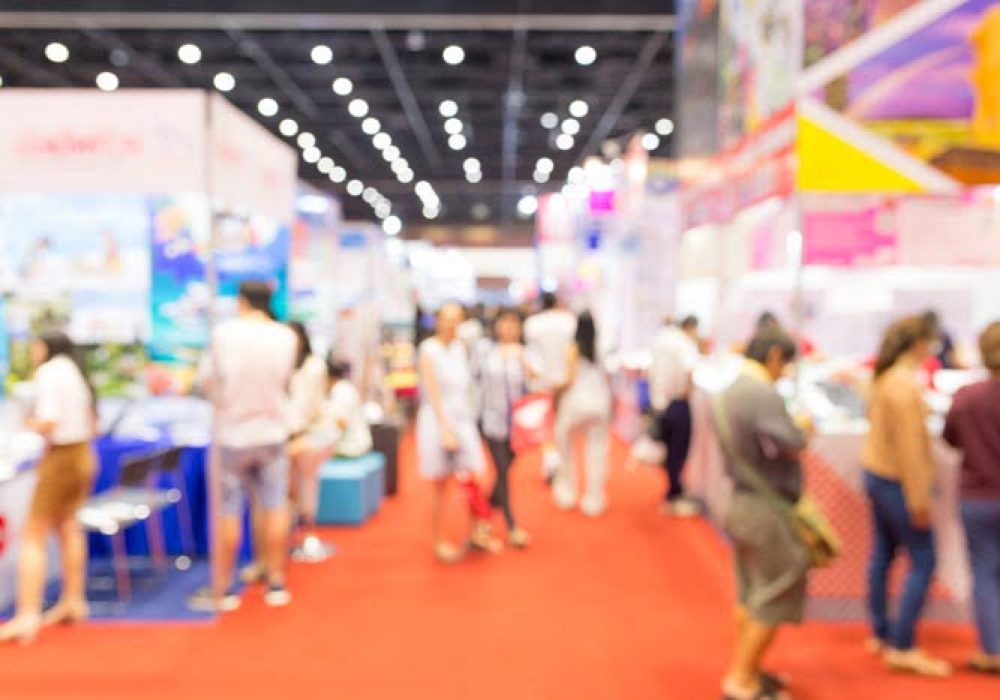 Abstract blurred event exhibition with people background, business convention show concept.