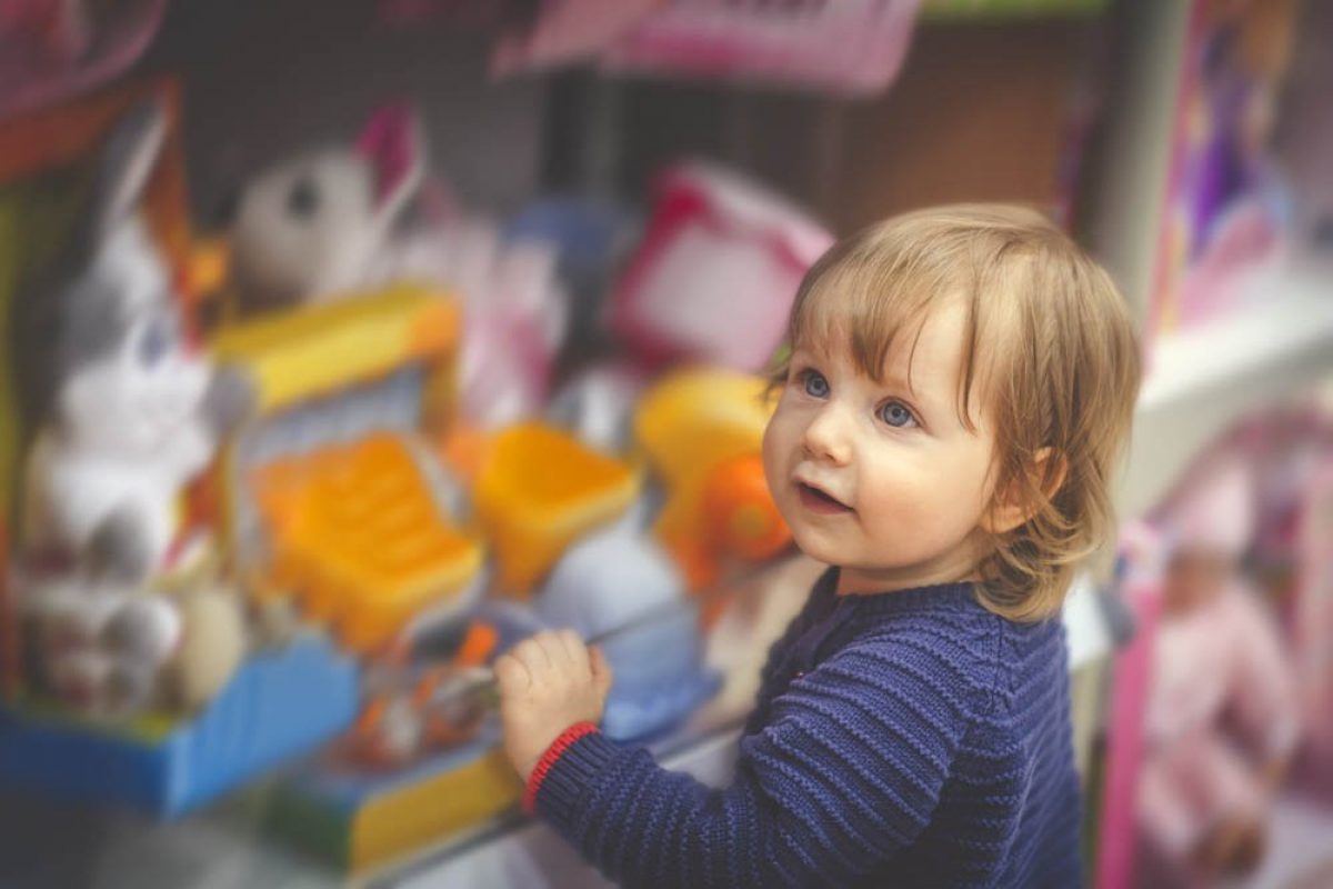 Cute child in toy store