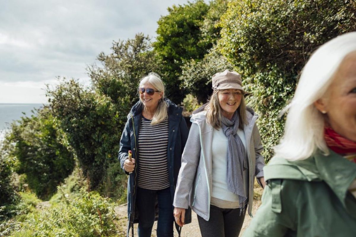 Three ladies walking in countryside