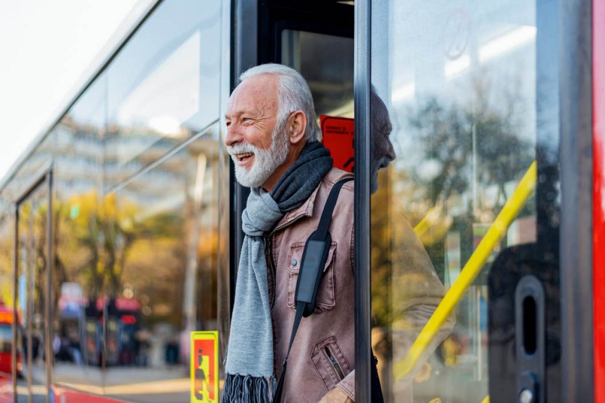 Mature Business Man Using Public Transportation