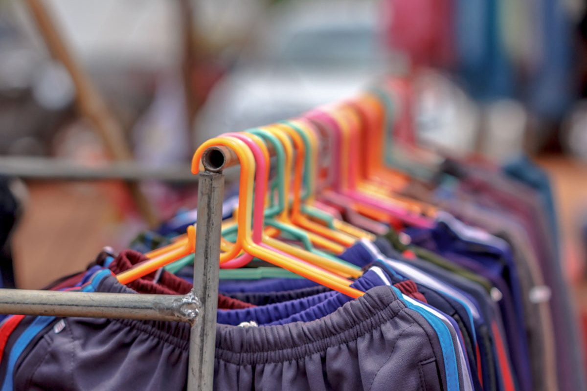 Hanger fabric shelves and t-shirts at a market