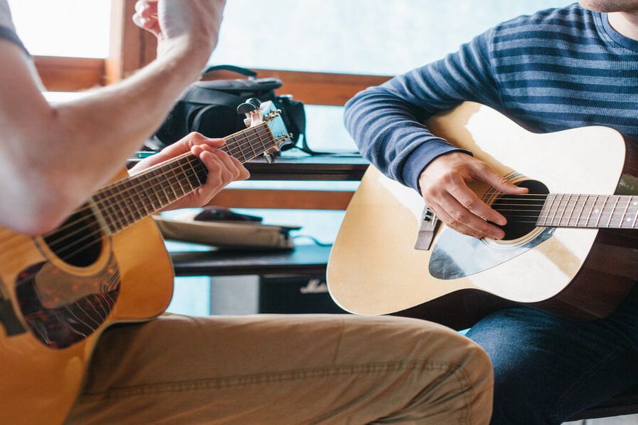 Learning to play the guitar. Music education and extra-curricular lessons.