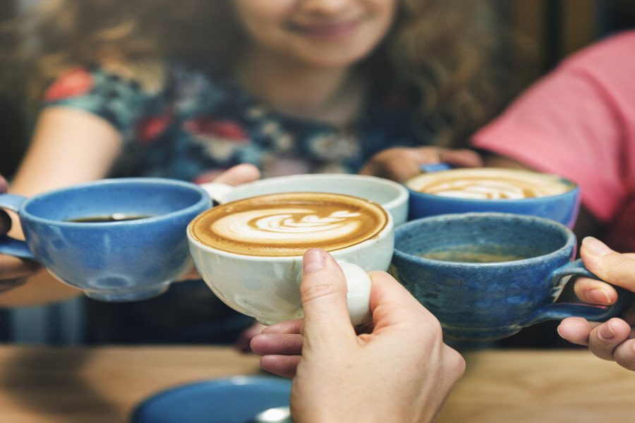 Young Women Drinking Coffee Concept