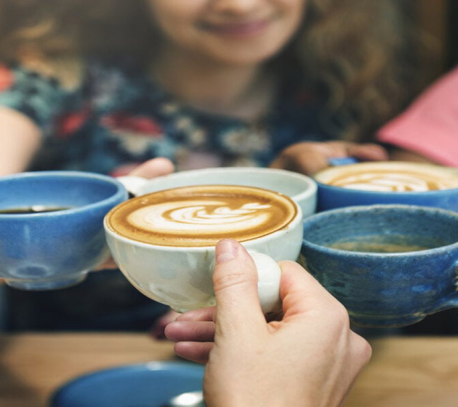 Young Women Drinking Coffee Concept